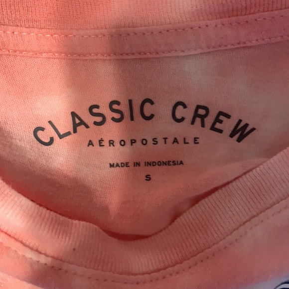 Pink shirt with “unity” word on front - Picture 4 of 4